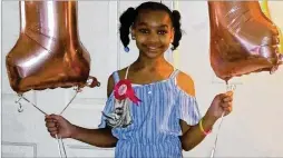  ?? COURTESY ?? Asijah Love Jones, 11, died early Tuesday when a stray bullet meant for someone else hit the girl in her Spalding County home. She was a month from her 12th birthday.