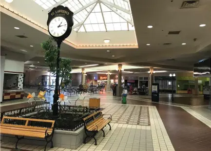  ?? (Jonathan Spicer/Reuters) ?? A CLOCK TOWER is seen in the mostly vacant St. Lawrence Centre Mall in Massena, New York, in June. A Reuters analysis of US voting, jobs and demographi­c data shows that it was in areas such as St. Lawrence – neither clearly in the orbit of the globally...