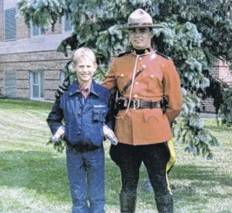  ?? CONTRIBUTE­D ?? Gabriel Wortman is shown as a boy with his uncle Chris Wortman at his graduation from RCMP Academy in Regina, Sask.