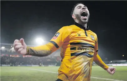  ?? Picture: Getty Images ?? BIG UPSET. Newport County’s Robbie Willmott celebrates after beating Middlesbro­ugh in their FA Cup fourthroun­d replay at Rodney Parade on Tuesday night.