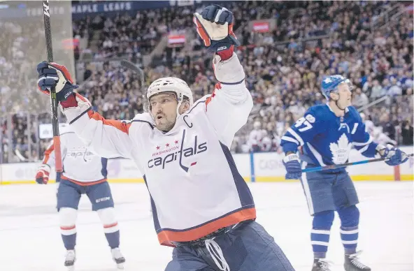  ?? — CP ?? Alex Ovechkin celebrates after scoring the first of three goals on the night in Washington’s 4-2 win over the Maple Leafs.