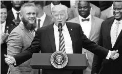  ?? PHOTO: AP/PTI ?? President Donald Trump during a ceremony on the South Lawn of the White House in Washington on Monday where he honoured the 2016 NCAA Football National Champions Clemson University Tigers