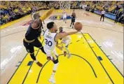  ?? Marcio Jose Sanchez European Pressphoto Agency ?? STEPHEN CURRY of Golden State moves against Cleveland’s LeBron James in the NBA Finals.