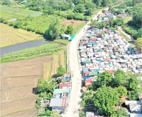  ?? PHOTOGRAPH COURTESY OF DPWH ?? THE Department of Public Works and Highways completes the constructi­on of road connectors for the rural communitie­s in Tarlac City as part of the agency’s farm-to-market program.