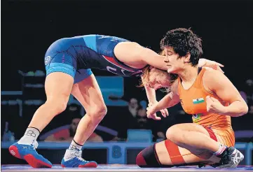  ?? ?? India’s Shivani Pawar (R) in action against Emily Shilson of USA in the U-23 women’s world wrestling 50kg final.