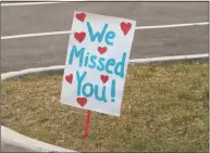  ??  ?? A sign outside of Stadley Rough Elementary School welcomes students, teachers and staff.