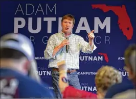  ?? ALLEN EYESTONE / THE PALM BEACH POST ?? Republican gubernator­ial candidate Adam Putnam struggled to minimize President Donald Trump’s endorsemen­t of his rival.