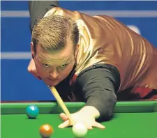  ??  ?? Shaun Murphy (above) held off a strong comeback from Ronnie O’Sullivan to be crowned snooker’s Champion of Champions. He won 10-8 in Coventry.