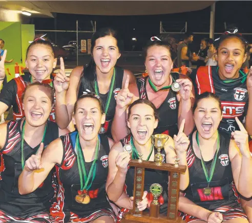  ?? Picture: JUSTIN BRIERTY ?? STILL NO. 1: Saints celebrate their win over Sharks at the Cairns Netball Associatio­n grand final.