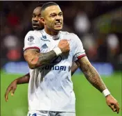  ?? (Photos AFP) ?? Memphis Depay, coeur de Lyon !