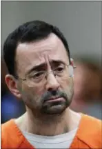  ?? AP PHOTO/PAUL SANCYA ?? In this Nov. 22, 2017, file photo, Dr. Larry Nassar appears in court for a plea hearing in Lansing, Mich.