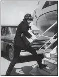  ?? Special to the Democrat-Gazette/ NEWELL MOCK ?? John Lennon boards an airplane at the Walnut Ridge airport in September 1964.