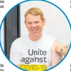  ??  ?? Chris Hipkins wore the shirt while he got his first jab.