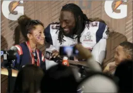  ?? CHUCK BURTON - THE ASSOCIATED PRESS ?? New England Patriots’ LeGarrette Blount appears at a news conference with his family after Super Bowl 51 against the Atlanta Falcons Sunday, Feb. 5, 2017, in Houston. The Patriots defeated the Falcons 34-28 in overtime.