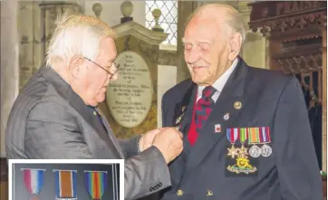  ?? Main picture: Stuart Kirk; inset: Kent Police ?? Barry Pain from the Royal British Legion pins the medals; inset, the stolen First World War medals