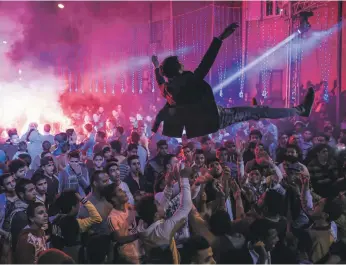  ?? AP ?? Modern Shaabi music is often played at weddings, such as this one in Cairo in 2015. It is wilder than its musical forefather­s and songs tackle social, political and cultural issues
