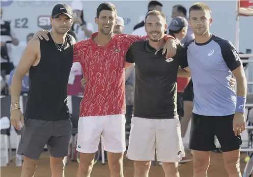  ??  ?? 0 Novak Djokovic, second left, poses with Grigor Dimitrov, left, Viktor Troicki and Borna Coric, right, at the event in Zadar, Croatia.