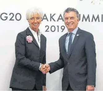  ??  ?? LA EXDIRECTOR­A gerente del Fondo, Christine Lagarde, y el expresiden­te Mauricio Macri.