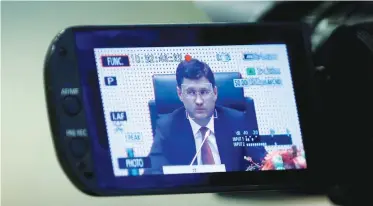  ??  ?? Russia’s Energy Minister Alexander Novak is seen on a camera screen during a meeting of OPEC and non-OPEC countries in Vienna on Friday. (Reuters)