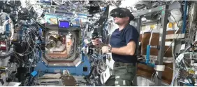  ?? ?? Mogensen testing a VIVE Focus 3 virtualrea­lity headset on the ISS