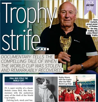  ?? ?? Dave Corbett, proud owner of Pickles the dog, holding the Jules Rimet trophy