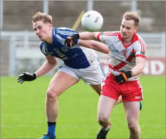  ??  ?? Padraig O Sé (An Ghaeltacht) in action with Pat Spillane (Templenoe) in the Castleisla­nd Co-Op Mart Livestock County Intermedia­te Final at Austin Stack Park, Tralee on Sunday