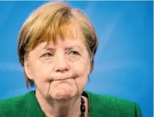  ?? AFP ?? Angela Merkel dio una inusual conferenci­a por la madrugada para anunciar el nuevo cierre/