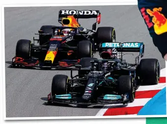  ?? GETTY IMAGES ?? Pass master: Hamilton (right) sweeps past Verstappen