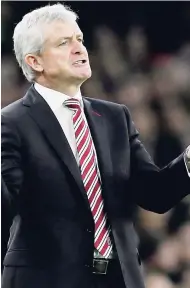  ?? AP ?? Stoke City manager Mark Hughes gestures during the English Premier League match between Arsenal and Stoke City at the Emirates stadium in London on Saturday December10.