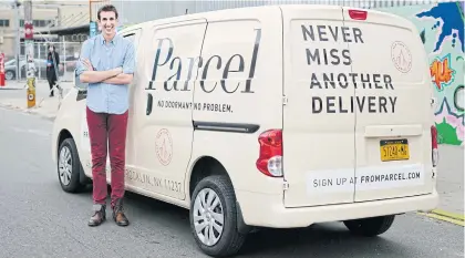  ?? PARCEL INC VIA AP ?? In this file photo, Jesse Kaplan, founder & CEO of Parcel Inc, poses with a cargo van from Parcel’s fleet in the Brooklyn borough of New York.