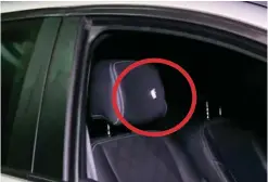  ??  ?? Narrow miss: A bullet hole, circled, in the car headrest