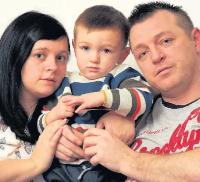  ??  ?? Jordan Phipps and his partner Sara Hiscox lost their baby boy Kodi, pictured left, aged 13 months, to a very rare condition called PMD. Jordan and Sara are pictured with their two-year-old son Kobi