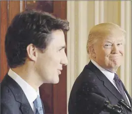  ?? CP PhOTO ?? Prime Minister Justin Trudeau and U.S. President Donald Trump take part in a joint news conference at the White House. Trump says he didn’t announce the cancellati­on of NAFTA this week because he likes Trudeau and Mexican President Enrique Pena Nieto.