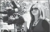  ?? PHOTO COURTESY OF NADINE TORREN BUBECK ?? Nadine Torren Bubeck on location when she worked at Fox- 5 in San Diego.