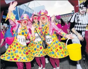  ??  ?? Those that took part were treated to a whole host of carnival entertainm­ent, and walkers came dressed as clowns, lion tamers, mime artists, circus acts and even fortune tellers, taking to the streets of Leicester to walk 10km to raise money for the...