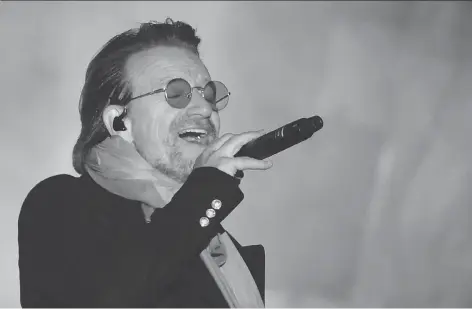  ?? CHRIS J RATCLIFFE/GETTY IMAGES ?? Bono and his band U2 will release a new album, Songs of Experience, on Dec. 1.