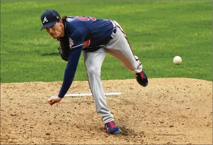  ?? MATT SLOCUM/ASSOCIATED PRESS ?? Braves left-hander Max Fried made his first opening-day start and kept his team in the game despite not having his best stuff. Fried allowed two runs on six hits in five innings. He walked two and struck out eight.