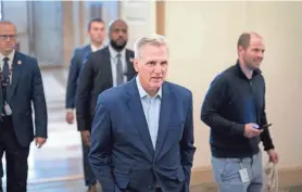  ?? J. SCOTT APPLEWHITE/AP ?? House Speaker Kevin McCarthy and the White House are straining to strike a budget compromise. The two sides are narrowing difference­s on an agreement that would curb spending and lift the borrowing limit.