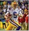  ?? AP/MATTHEW HINTON ?? LSU quarterbac­k Joe Burrow, who passed for 327 yards and 3 scores, led the Tigers to a touchdown on their first possession.