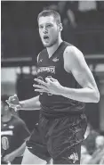  ?? ASSOCIATED PRESS FILE PHOTO ?? South Dakota State’s Mike Daum reacts after making a 3-pointer against Mississipp­i during a game on Nov. 28 in Oxford, Miss. Daum heads a list of notable players from one-bid leagues relishing their chance at the spotlight this week.