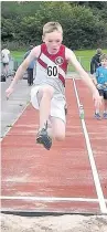  ??  ?? Jacob Tidswell in the U11 long jump