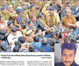  ??  ?? Family of deceased Rocky Gulia (inset) during a protest in Rohtak on Saturday. MANOJ DHAKA/HT