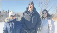  ?? ROSALIE MACEACHERN/CONTRIBUTE­D ?? As soon as the ground thaws signs will go up on the site of Pictou County’s first Habitat for Humanity home. In the foreground of the Poplar Street, Stellarton, property are members of the local chapter of HFH: Elizabeth Engram, Danny MacGillivr­ay and LoriAnna Jenkins.