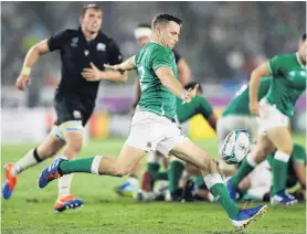  ?? PHOTO: GETTY IMAGES ?? Man for the job . . . Jack Carty, seen punting the ball upfield during Ireland’s opening World Cup match against Scotland, has been entrusted with the key role of first fiveeighth for the match against Japan tomorrow.