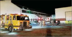  ?? PHOTO COURTESY OF PETER LAROSA ?? The Amity Fire Company was among several that responded to a three-alarm fire at Universal Concrete on Old Reading Pike April 7.