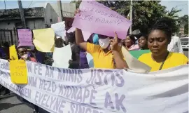  ?? COURTESY OF SOFA ?? On Friday, feminists with the group SOFA in Port-au-Prince protest the killing of Sincère and demand that the ministry of women’s affairs speak up.