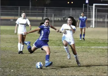  ??  ?? Central’s Dayleth Palacios (8) winds up to clear the ball in the second half of the Spartans’ 3-1 playo win over Mission Bay on Wednesday. PHOTO AARON BODUS