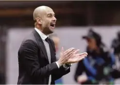  ??  ?? MONACO: In this file photo dated Wednesday March 15, 2017, Manchester City’s manager Pep Guardiola shouts instructio­ns during a Champions League leg soccer match against Monaco at the Louis II stadium in Monaco. —AP