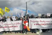  ??  ?? ALL TOGETHER NOW: From left, a prayer vigil in New York, protesters in Paris, MPs in London, and pupils at Parktown High School for Girls in Johannesbu­rg show their solidarity with the abducted Nigerian schoolgirl­s