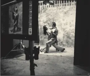  ??  ?? Left: Laetitia Casta and Sergei Polunin in a dance pose on the set of the 2019 Pirelli Calendar